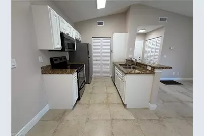 2214 Arbour Walk Cir #2024, Naples, FL 34109 - Photo 6