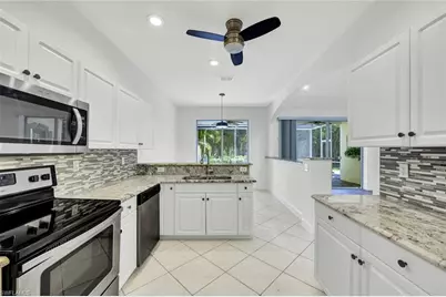 7488 Berkshire Pines Dr, Naples, FL 34104 - Photo 12