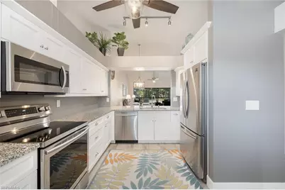 525 Lake Louise Cir #202, Naples, FL 34110 - Photo 2