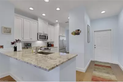 8241 Parkstone Pl #106, Naples, FL 34120 - Photo 2