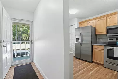 5654 Woodmere Lake Cir #C203, Naples, FL 34112 - Photo 10