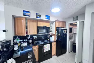 1240 Wildwood Lakes Blvd N, Naples, FL 34104 - Photo 6