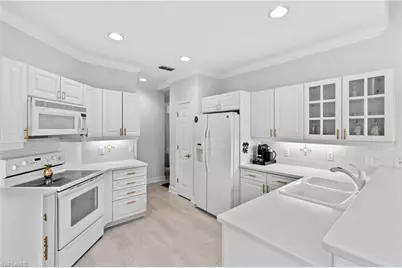 9066 Whimbrel Watch Ln #101, Naples, FL 34109 - Photo 18