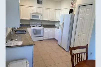 2288 Ashton Oaks Ln #7-103, Naples, FL 34109 - Photo 6