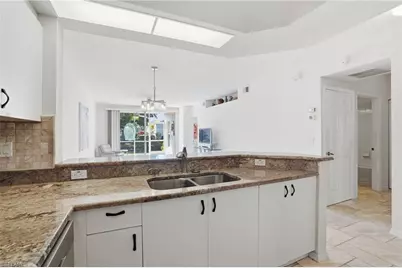 2460 Old Groves Rd #E102, Naples, FL 34109 - Photo 6