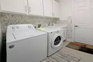 5758 Lago Villaggio Way, Naples, FL 34104 - Photo 38