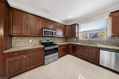 906 Sunniland Blvd, Lehigh Acres, FL 33971 - Photo 6