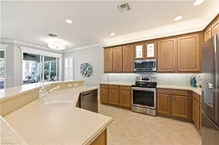5686 Lago Villaggio Way, Naples, FL 34104 - Photo 16