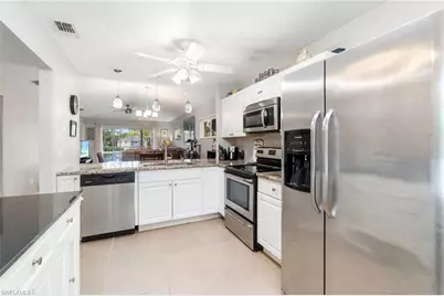 5700 Woodmere Lake Cir #E201, Naples, FL 34112 - Photo 10