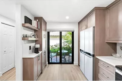 3219 Horse Carriage Way #303, Naples, FL 34105 - Photo 6