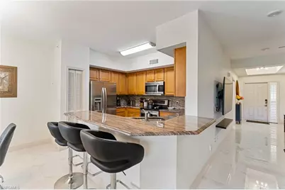 1190 Egrets Walk Cir #103, Naples, FL 34108 - Photo 6