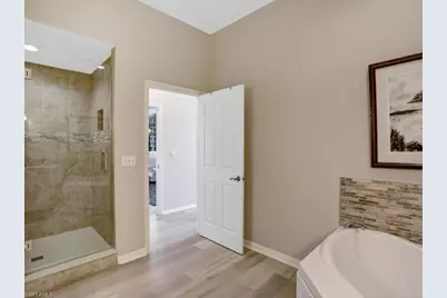 1051 Egrets Walk Cir #7-201, Naples, FL 34108 - Photo 20