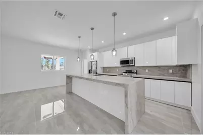 828 Genoa Ave S, Lehigh Acres, FL 33974 - Photo 6