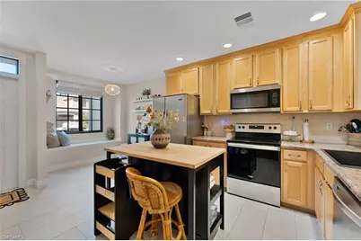 7785 Woodbrook Cir #2802, Naples, FL 34104 - Photo 2