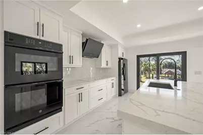 240 33rd Ave NE, Naples, FL 34120 - Photo 12