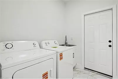 2621 59th St W, Lehigh Acres, FL 33971 - Photo 24