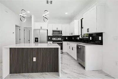 2621 59th St W, Lehigh Acres, FL 33971 - Photo 4