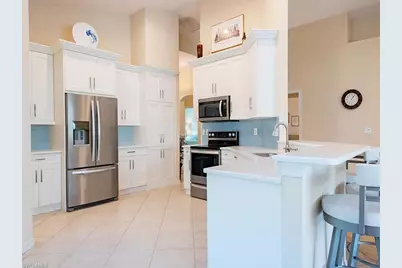 64 Glen Eagle Cir, Naples, FL 34104 - Photo 4