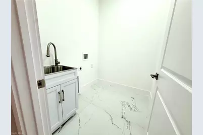 904 Asher St E, Lehigh Acres, FL 33974 - Photo 16