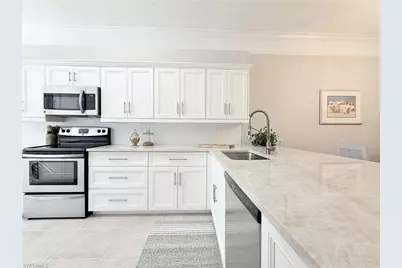 8555 Naples Heritage Dr #211, Naples, FL 34112 - Photo 2