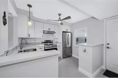 3055 Riviera Dr #102, Naples, FL 34103 - Photo 10