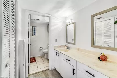 25398 Golf Lake Cir #104, Bonita Springs, FL 34135 - Photo 10