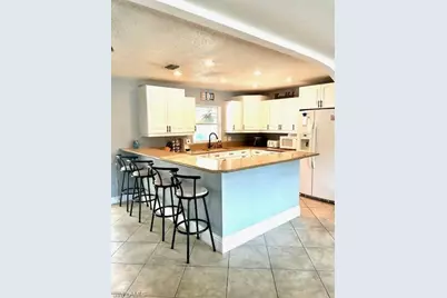 640 27th St SW, Naples, FL 34117 - Photo 14