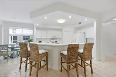 1634 Tarpon Bay Dr S #102, Naples, FL 34119 - Photo 2