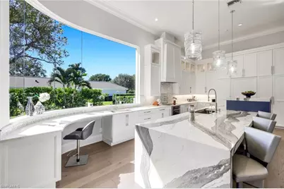 12924 Bald Cypress Ln, Naples, FL 34119 - Photo 10