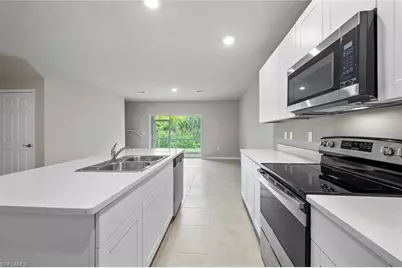 15319 Wildflower Cir, Naples, FL 34119 - Photo 2