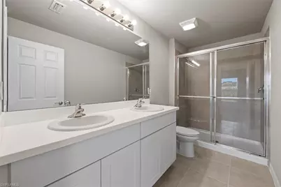 15319 Wildflower Cir, Naples, FL 34119 - Photo 8