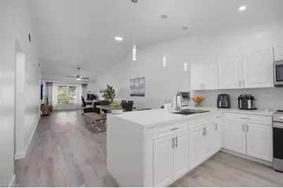 4100 Looking Glass Ln #3002, Naples, FL 34112 - Photo 6