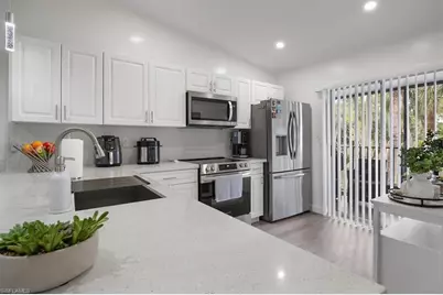 4100 Looking Glass Ln #3002, Naples, FL 34112 - Photo 2