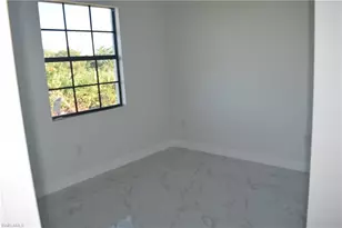 2555 25th St W, Lehigh Acres, FL 33971 - Photo 20