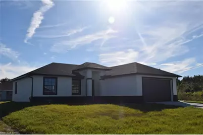 2555 25th St W, Lehigh Acres, FL 33971 - Photo 1