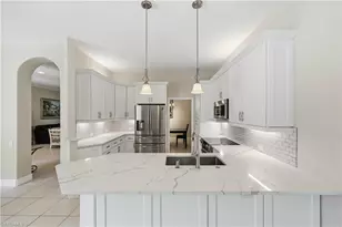 9227 Troon Lakes Dr, Naples, FL 34109 - Photo 18