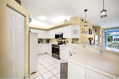 23810 Marbella Bay Rd #103, Estero, FL 34135 - Photo 6