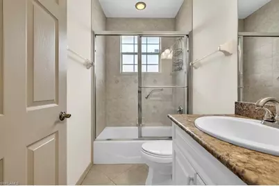 10823 Longshore Way E, Naples, FL 34119 - Photo 24