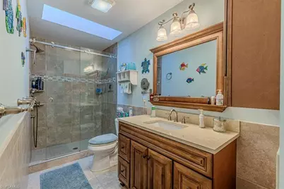 2442 Outrigger Ln, Naples, FL 34104 - Photo 18