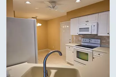 25069 Peacock Ln #101, Naples, FL 34114 - Photo 18