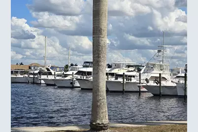 25069 Peacock Ln #101, Naples, FL 34114 - Photo 2