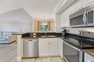 1265 Wildwood Lakes Blvd, Naples, FL 34104 - Photo 16