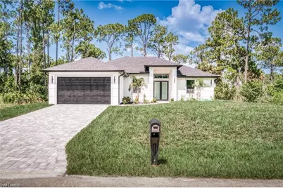 303 McArthur Ave, Lehigh Acres, FL 33936 - Photo 1