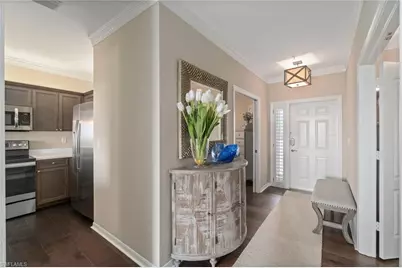 7687 Pebble Creek Cir #405, Naples, FL 34108 - Photo 18