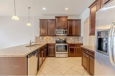 15389 Summit Place Cir #286, Naples, FL 34119 - Photo 8