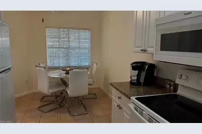 7518 Silver Trumpet Ln #Q102, Naples, FL 34109 - Photo 12