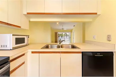 1915 Courtyard Way #G202, Naples, FL 34112 - Photo 4