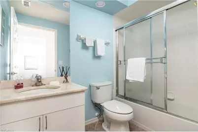 2585 Old Groves Rd #L102, Naples, FL 34109 - Photo 12