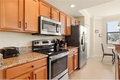 9816 Giaveno Cir #1317, Naples, FL 34113 - Photo 12