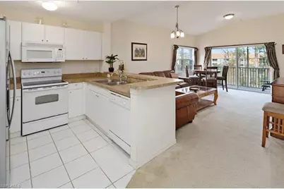 4510 Botanical Place Cir #402, Naples, FL 34112 - Photo 2